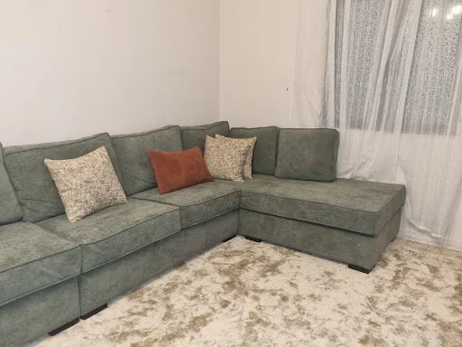 كنبة ركنية خضراء متكاملة في منزل عميل بجدة