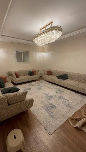 Neutral seating in a complete room — KLIK customer-home photograph