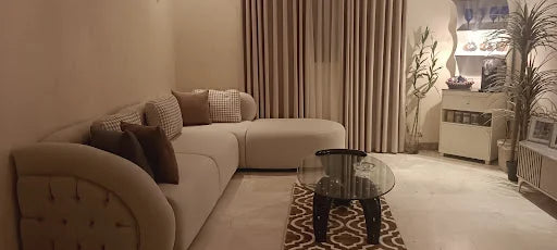 Rounded seating in a warm living room — KLIK customer-home photograph