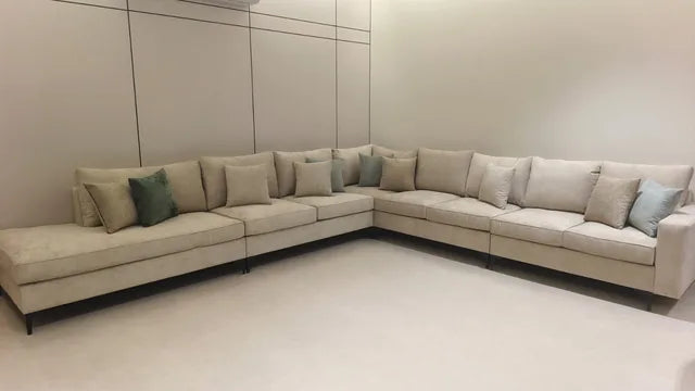 A wide neutral majlis arrangement — KLIK customer-home photograph