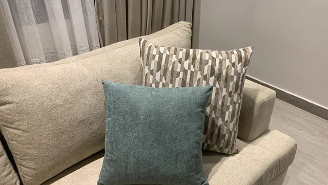 A closer view of the sofa cushions — KLIK customer-home photograph